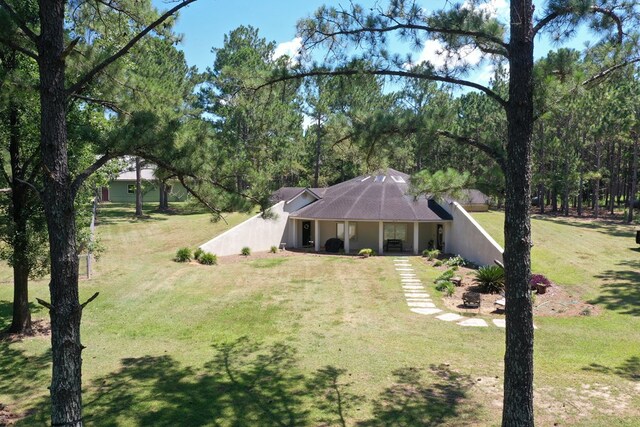 6715 Stewart Rd, Ochlocknee, GA 31773 - view of front of house with a front yard and covered porch