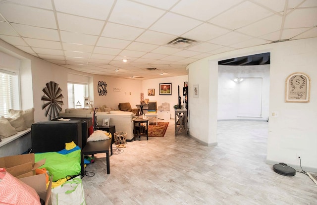 6715 Stewart Rd, Ochlocknee, GA 31773 - living room with wood finished floors and a paneled ceiling