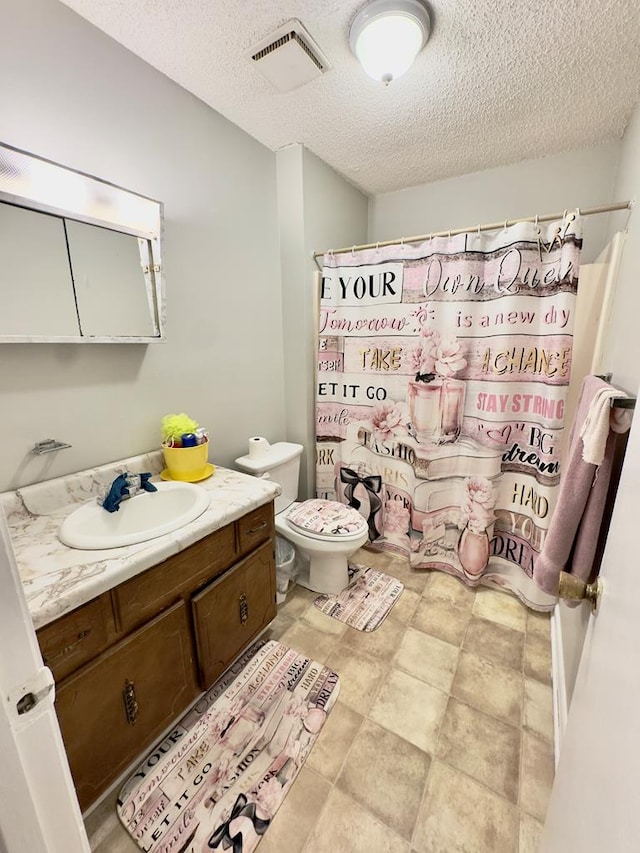 1197 Jo Ree St, Valdosta, GA 31601 - full bathroom with vanity, a textured ceiling, and curtained shower