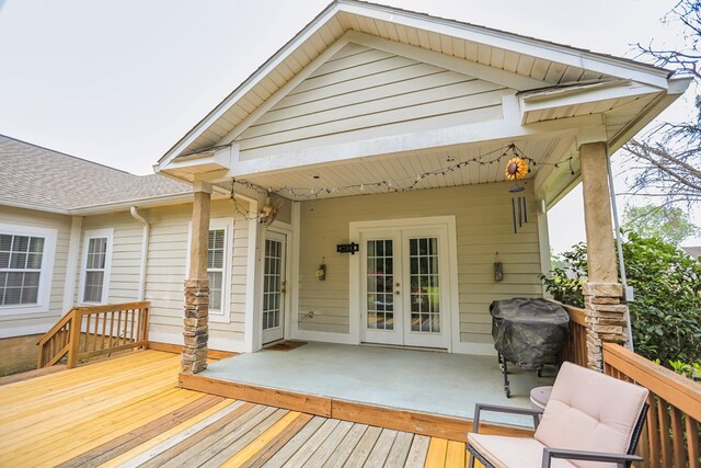 351 Virginia Cir, Cairo, GA 39828 - rear view of property featuring french doors, a deck, a shingled roof, and a patio
