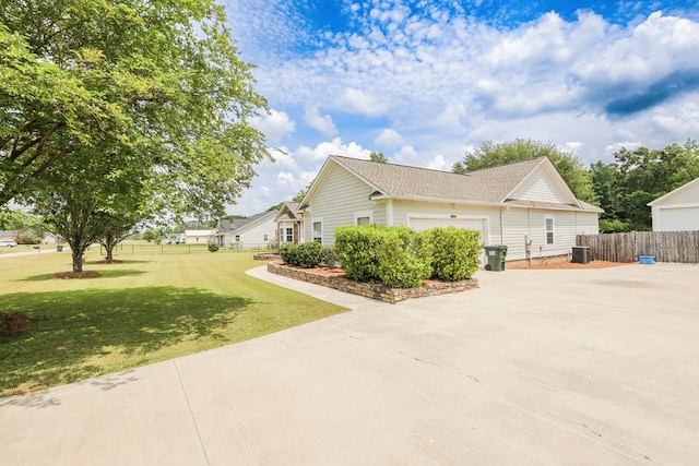 351 Virginia Cir, Cairo, GA 39828 - view of home's exterior featuring a garage, concrete driveway, central air condition unit, and a shingled roof