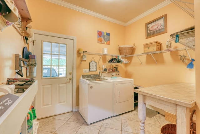 233 Fox Meadow Ln, Thomasville, GA 31757 - washroom with washing machine and dryer, crown molding, and light tile patterned flooring