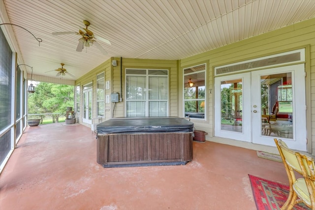 233 Fox Meadow Ln, Thomasville, GA 31757 - covered porch with a hot tub, french doors, and a ceiling fan