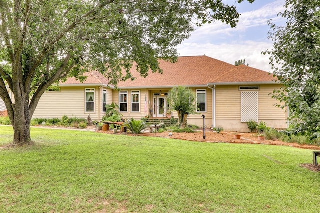 233 Fox Meadow Ln, Thomasville, GA 31757 - ranch-style home with a front lawn and a shingled roof