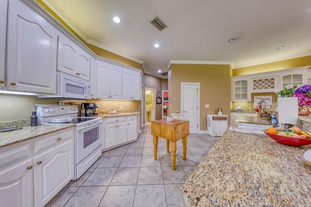 233 Fox Meadow Ln, Thomasville, GA 31757 - kitchen with white appliances, a sink, white cabinets, crown molding, and light tile patterned floors