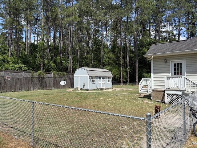 3794 Pine Park Rd, Cairo, GA 31778 - view of yard featuring an outdoor structure, a storage unit, and a fenced backyard