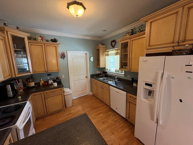 3794 Pine Park Rd, Cairo, GA 31778 - kitchen featuring a sink, glass insert cabinets, light wood-type flooring, white appliances, and ornamental molding