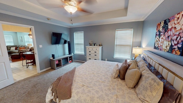 106 Hayden Way, Thomasville, GA 31792 - carpeted bedroom with a raised ceiling, multiple windows, ornamental molding, a ceiling fan, and baseboards