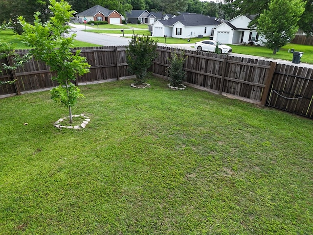 106 Hayden Way, Thomasville, GA 31792 - view of yard with a residential view, concrete driveway, and a garage