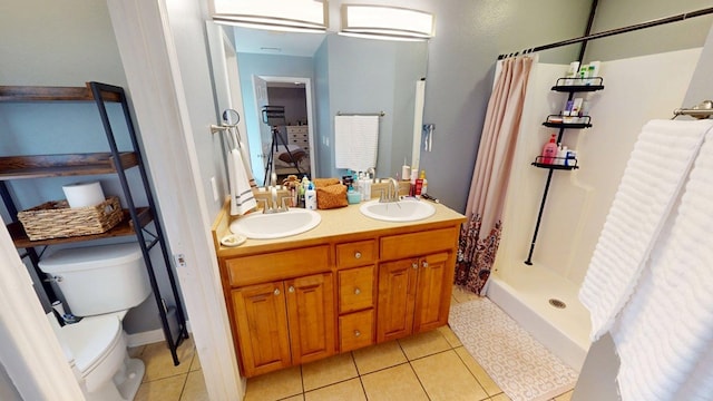 106 Hayden Way, Thomasville, GA 31792 - full bathroom featuring toilet, tile patterned floors, a shower stall, and double vanity