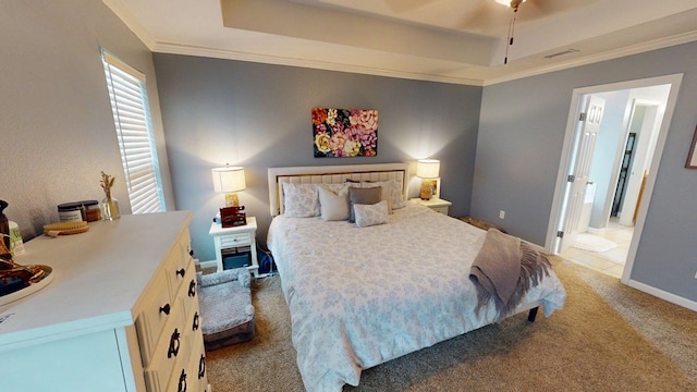 106 Hayden Way, Thomasville, GA 31792 - bedroom with light carpet, a raised ceiling, crown molding, and baseboards