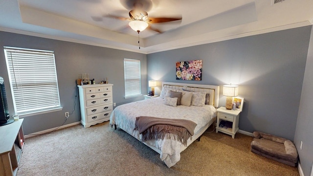 106 Hayden Way, Thomasville, GA 31792 - bedroom with a raised ceiling, carpet floors, baseboards, multiple windows, and crown molding