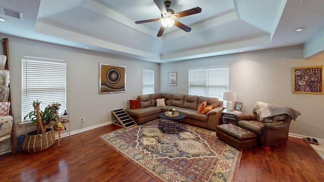 106 Hayden Way, Thomasville, GA 31792 - living room with a tray ceiling, ceiling fan, baseboards, and wood finished floors