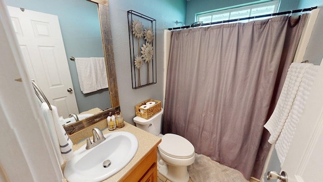 106 Hayden Way, Thomasville, GA 31792 - bathroom with toilet, vanity, and curtained shower