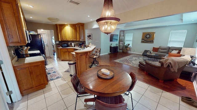 106 Hayden Way, Thomasville, GA 31792 - dining room featuring light tile patterned floors, recessed lighting, and baseboards