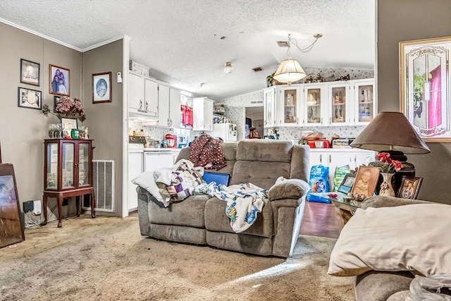 living room featuring light colored carpet, lofted ceiling, and a textured ceiling