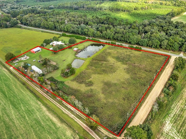 aerial view featuring a water view and a rural view