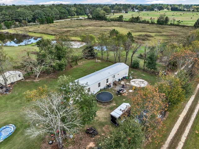 drone / aerial view featuring a water view and a rural view