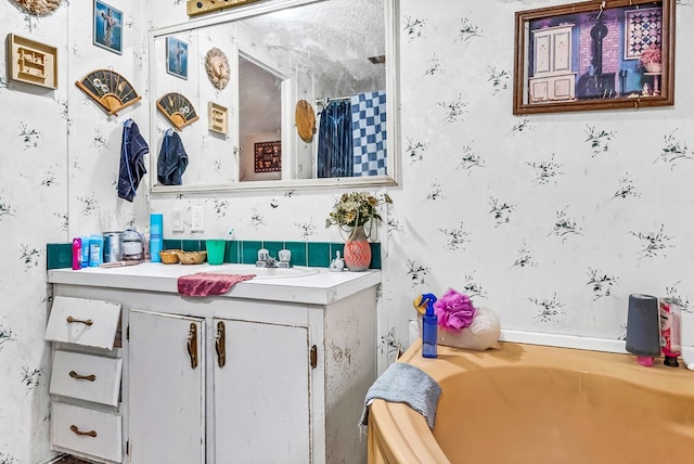 bathroom with independent shower and bath and vanity