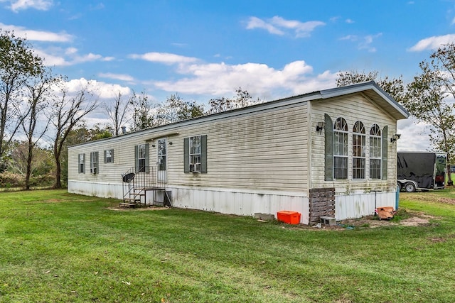 view of property exterior featuring a yard