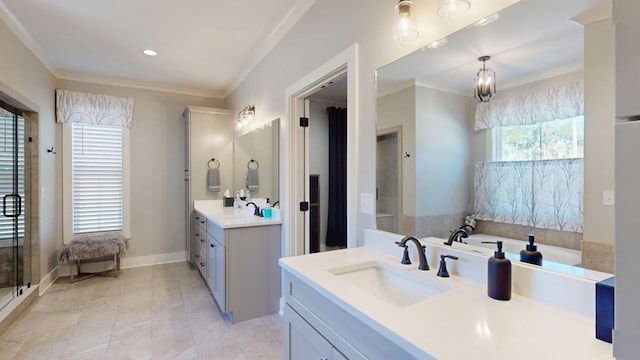 bathroom featuring shower with separate bathtub, tile patterned floors, crown molding, and vanity