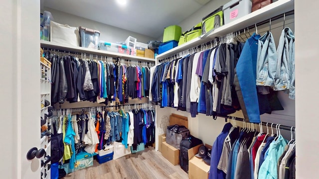 walk in closet featuring hardwood / wood-style floors