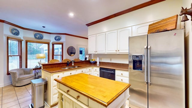 kitchen with black dishwasher, ornamental molding, a peninsula, stainless steel refrigerator with ice dispenser, and a sink