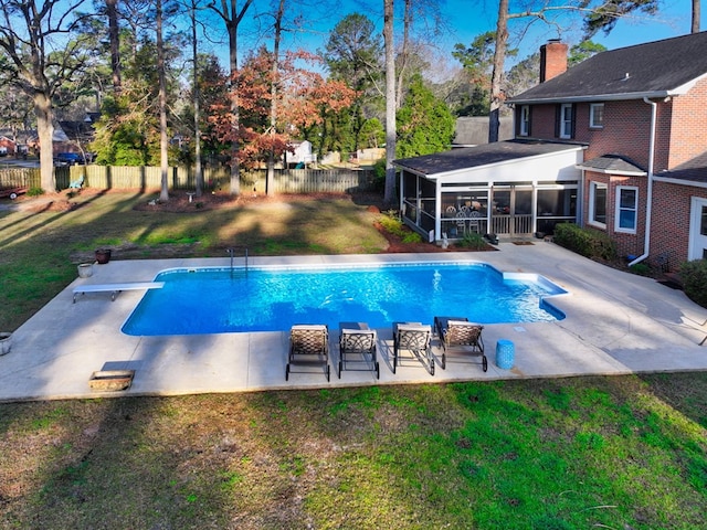 view of pool with a fenced in pool, a sunroom, a fenced backyard, and a yard