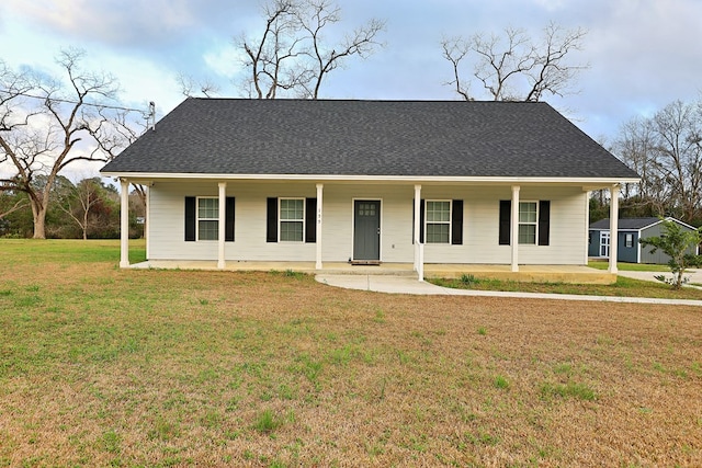 view of front of property with covered porch and a front yard