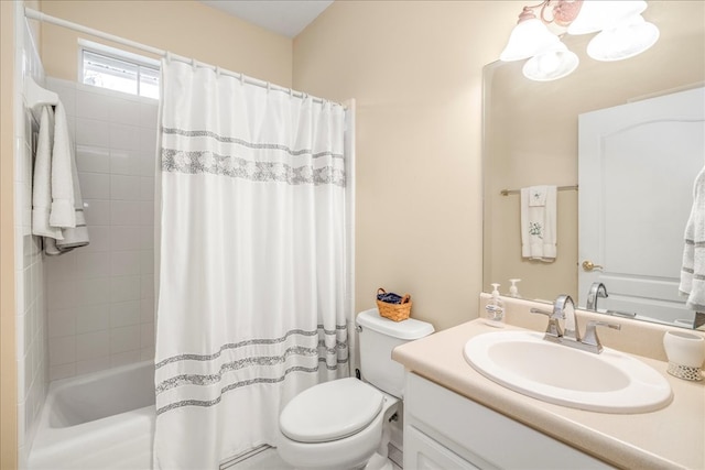 bathroom featuring shower / tub combo with curtain, vanity, and toilet