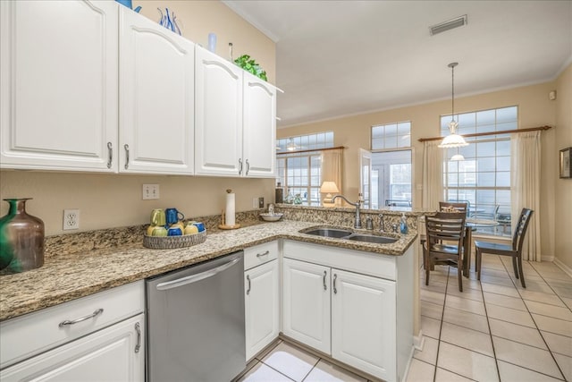 kitchen featuring visible vents, dishwasher, ornamental molding, a peninsula, and a sink