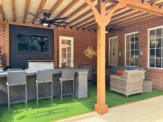 7827 Metcalf Rd, Thomasville, GA 31792 - view of patio / terrace featuring exterior bar, an outdoor hangout area, and ceiling fan