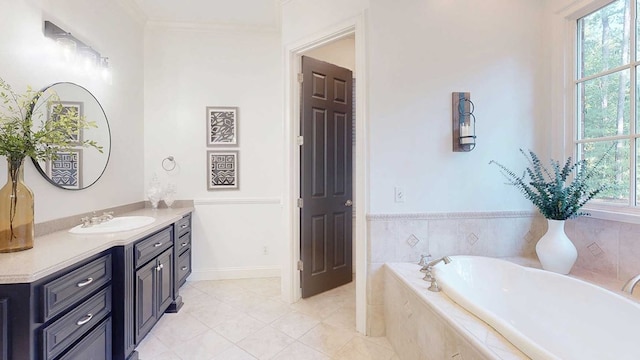 7827 Metcalf Rd, Thomasville, GA 31792 - full bath featuring vanity, a garden tub, healthy amount of natural light, tile patterned flooring, and crown molding