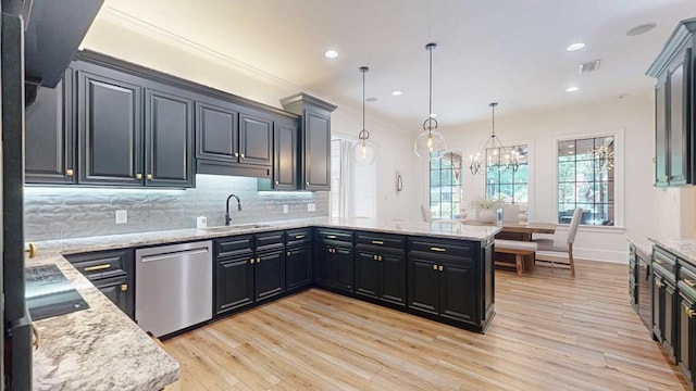 7827 Metcalf Rd, Thomasville, GA 31792 - kitchen with dishwasher, light wood-type flooring, tasteful backsplash, light stone countertops, and recessed lighting