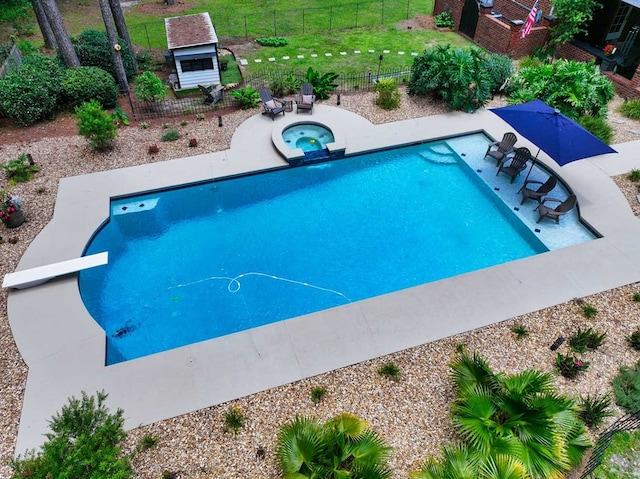 7827 Metcalf Rd, Thomasville, GA 31792 - view of pool with a patio area, a diving board, and a pool with connected hot tub