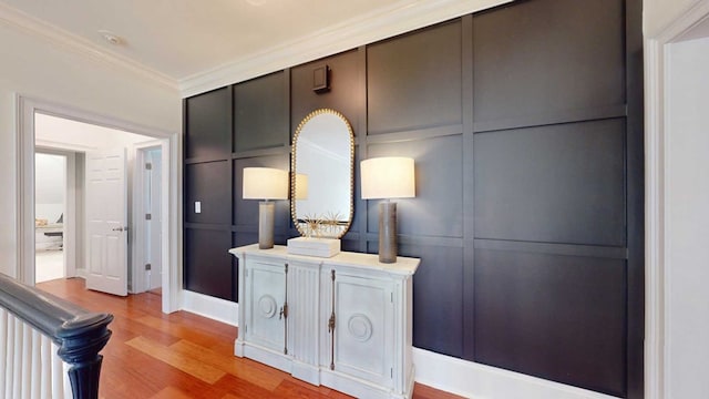 7827 Metcalf Rd, Thomasville, GA 31792 - hall featuring light wood-style flooring and crown molding