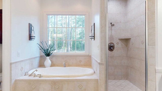 7827 Metcalf Rd, Thomasville, GA 31792 - bathroom with a garden tub, a shower stall, and plenty of natural light