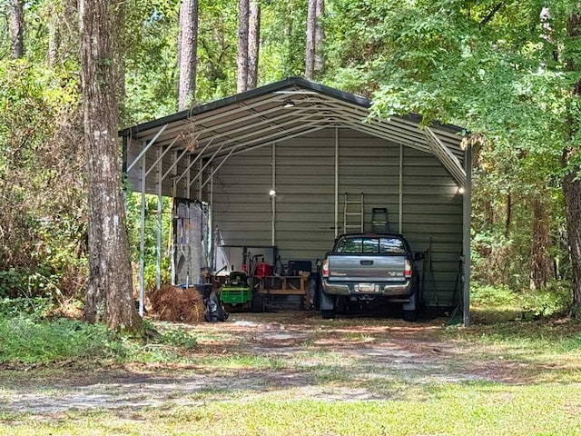 7827 Metcalf Rd, Thomasville, GA 31792 - view of parking / parking lot featuring a detached carport