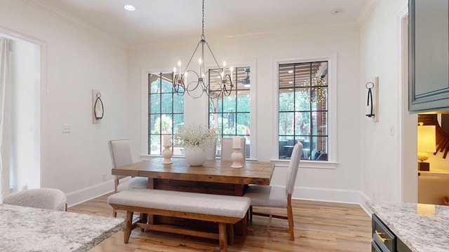 7827 Metcalf Rd, Thomasville, GA 31792 - dining room with a chandelier, light wood-type flooring, and ornamental molding