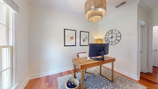 7827 Metcalf Rd, Thomasville, GA 31792 - home office featuring ornamental molding, wood finished floors, and a chandelier