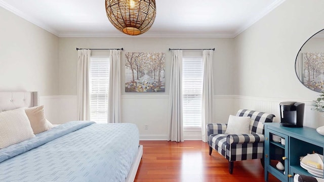 7827 Metcalf Rd, Thomasville, GA 31792 - bedroom with wood finished floors, a wainscoted wall, and crown molding