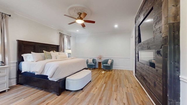 7827 Metcalf Rd, Thomasville, GA 31792 - bedroom featuring light wood finished floors, ornamental molding, recessed lighting, a wainscoted wall, and ceiling fan