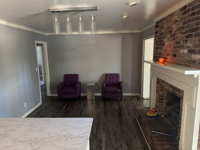 sitting room featuring ornamental molding, dark hardwood / wood-style floors, and a brick fireplace