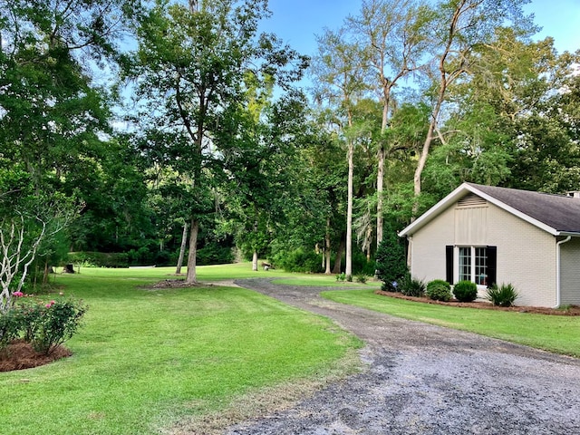 exterior space featuring gravel driveway