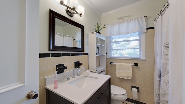 bathroom featuring tile walls, vanity, toilet, crown molding, and a shower with curtain