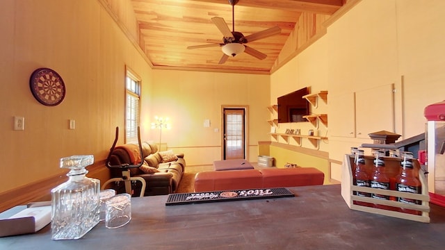 interior space with wood ceiling, ceiling fan, and high vaulted ceiling