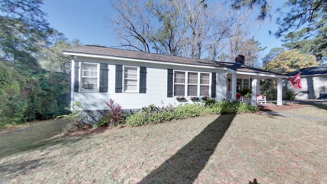 single story home with a front yard