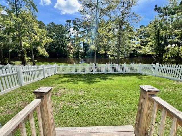 view of yard featuring a water view