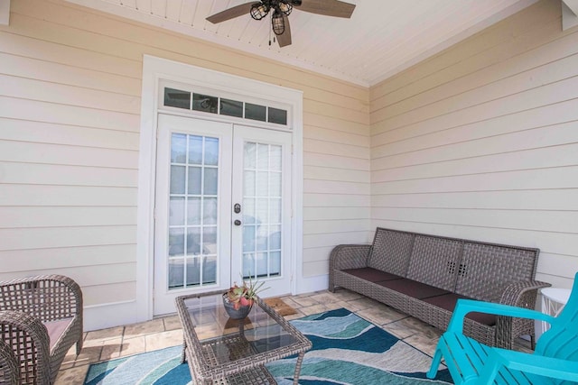 exterior space featuring ceiling fan, wood ceiling, wooden walls, and french doors