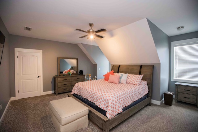 bedroom with ceiling fan, carpet flooring, and vaulted ceiling